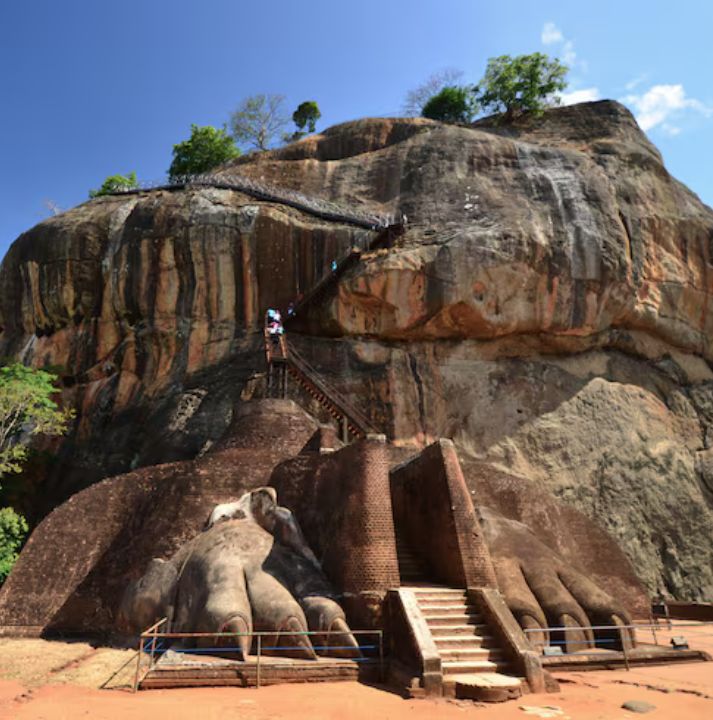 Tourists climbing Sigiriya Lion Rock ancient heritage site